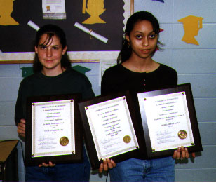 Chauntiel and Shimike with plaques